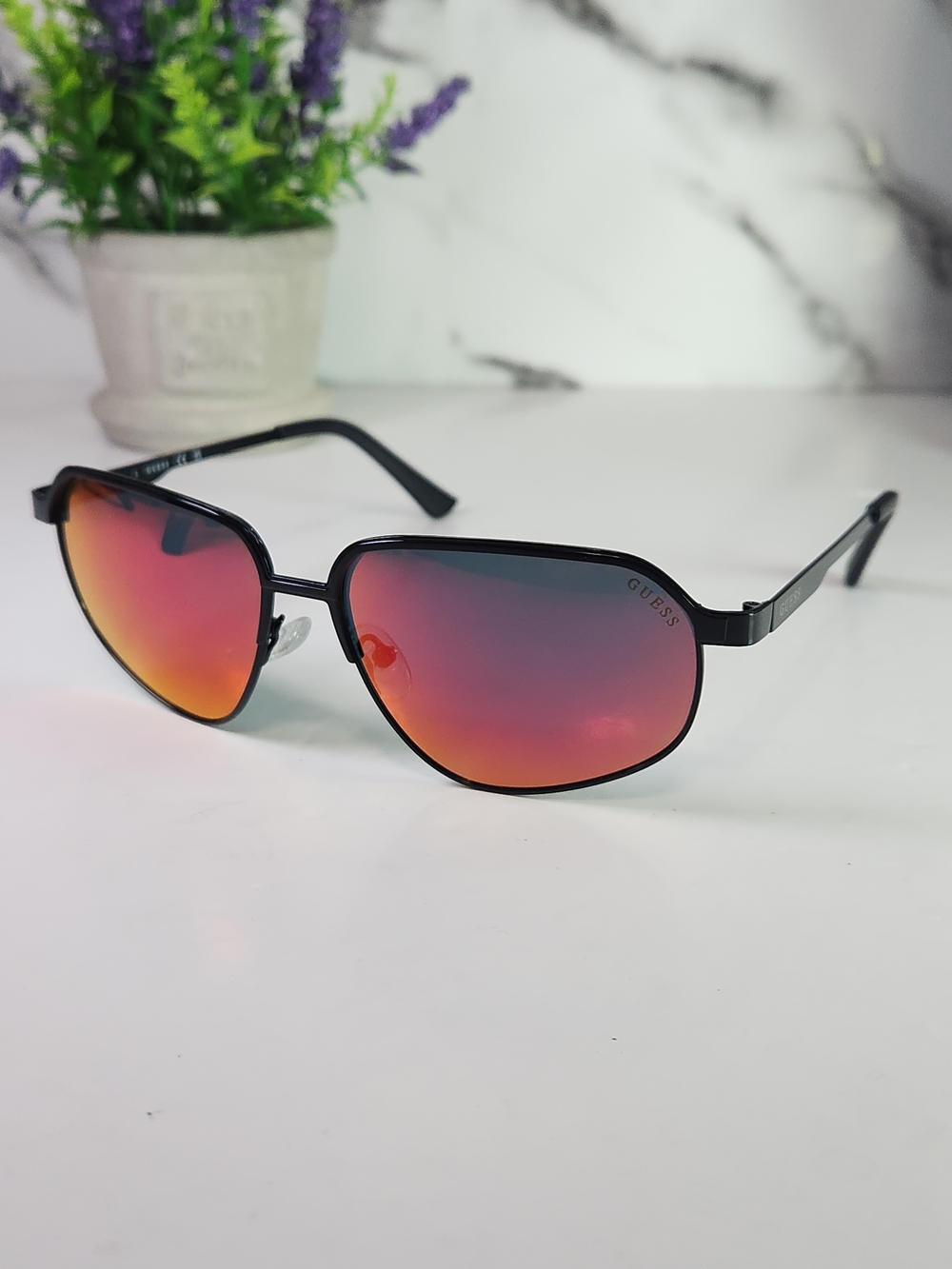 GUESS Black Frame Sunglasses with Red-Orange Mirrored Lenses